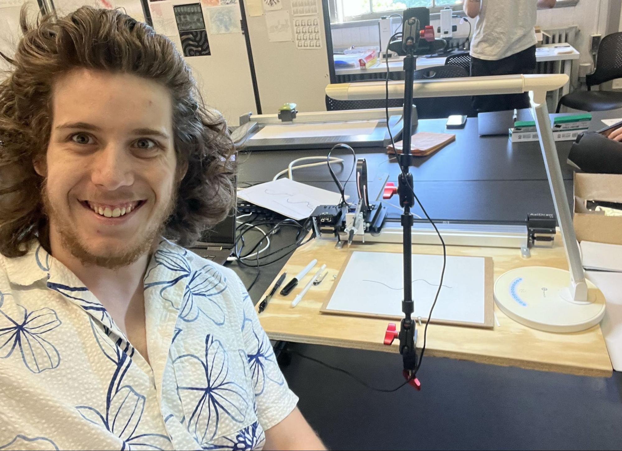 The rig set up in the studio, with a hand-drawn line on the plotter bed
