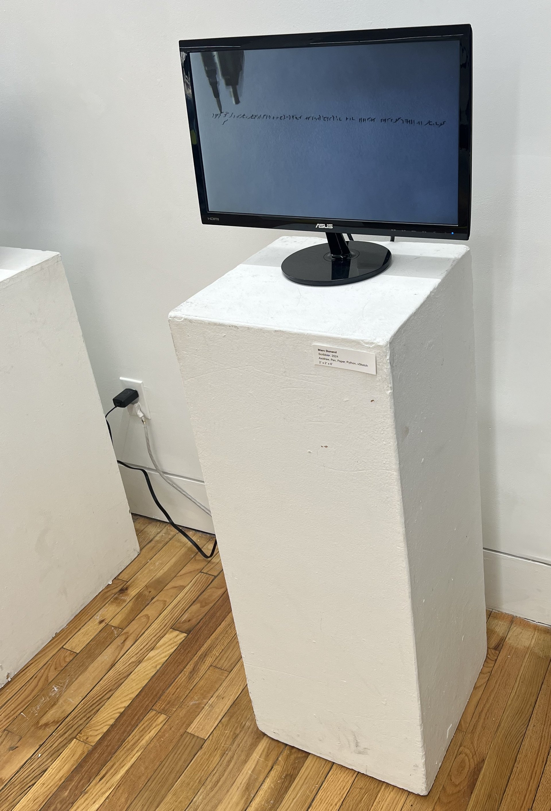 Scribbler installed on white plinths at The Frame Gallery