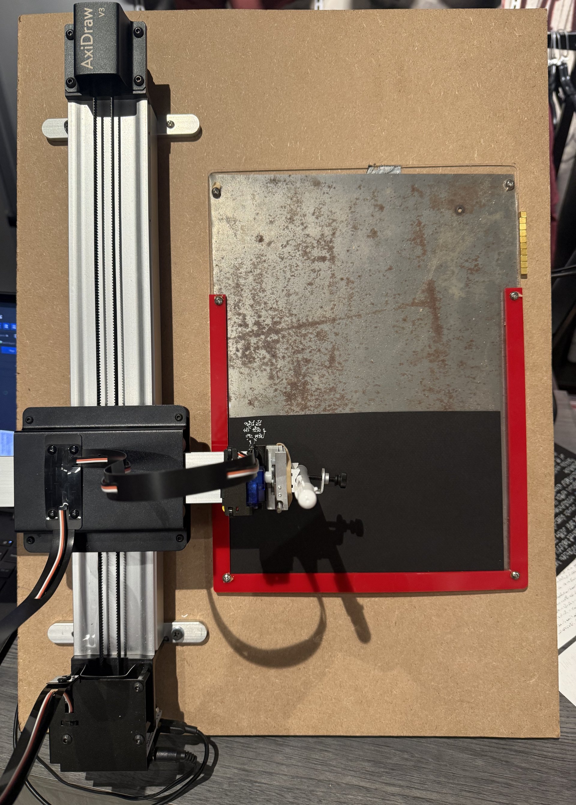 The finished near-vertical stand holding the Axidraw and its paper